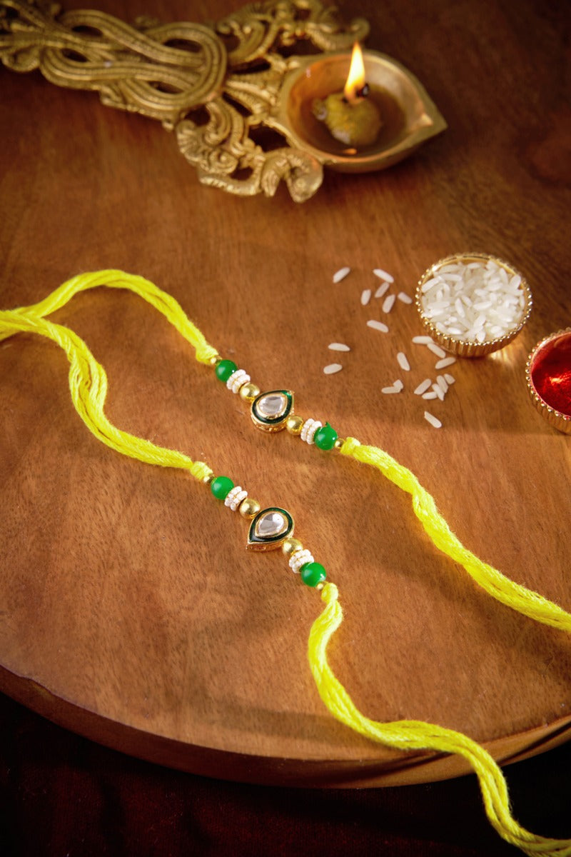 Deep Shaped Kundan Rakhi Set Of 2