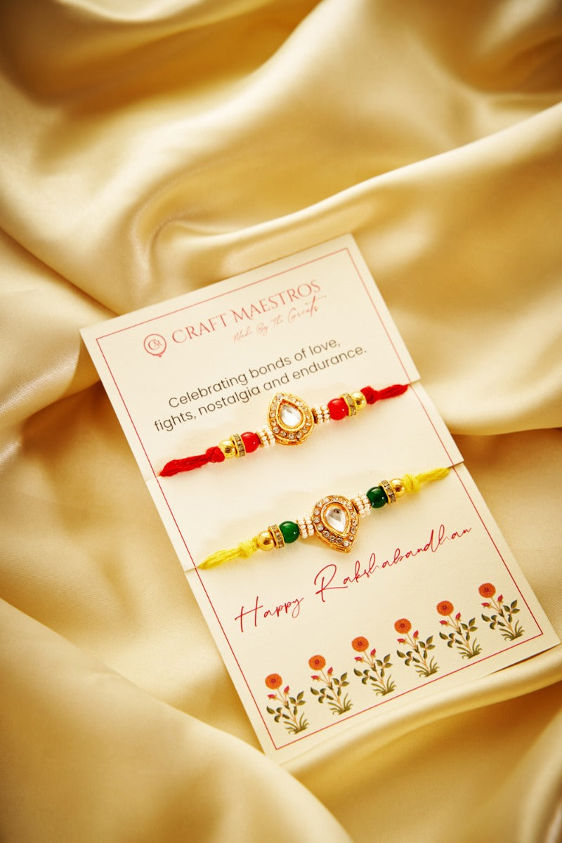 Diya Shaped Kundan Rakhi Set Of 2