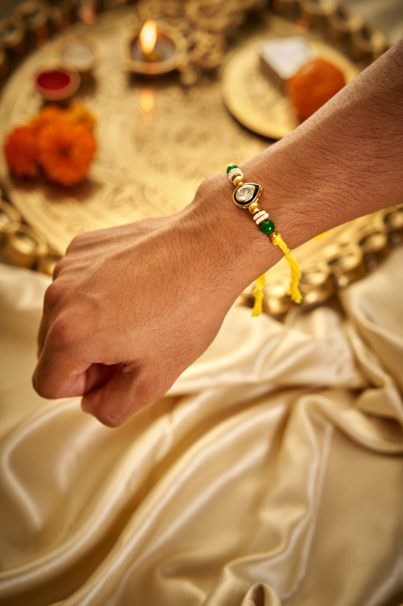 Deep Shaped Kundan Rakhi Set Of 2